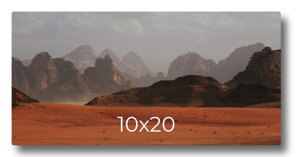 Sample photo print mockup displaying a desert landscape with rocky mountains labeled with print dimensions 10x20