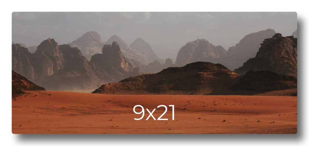 Sample photo print mockup displaying a desert landscape with rocky mountains labeled with print dimensions 9x21